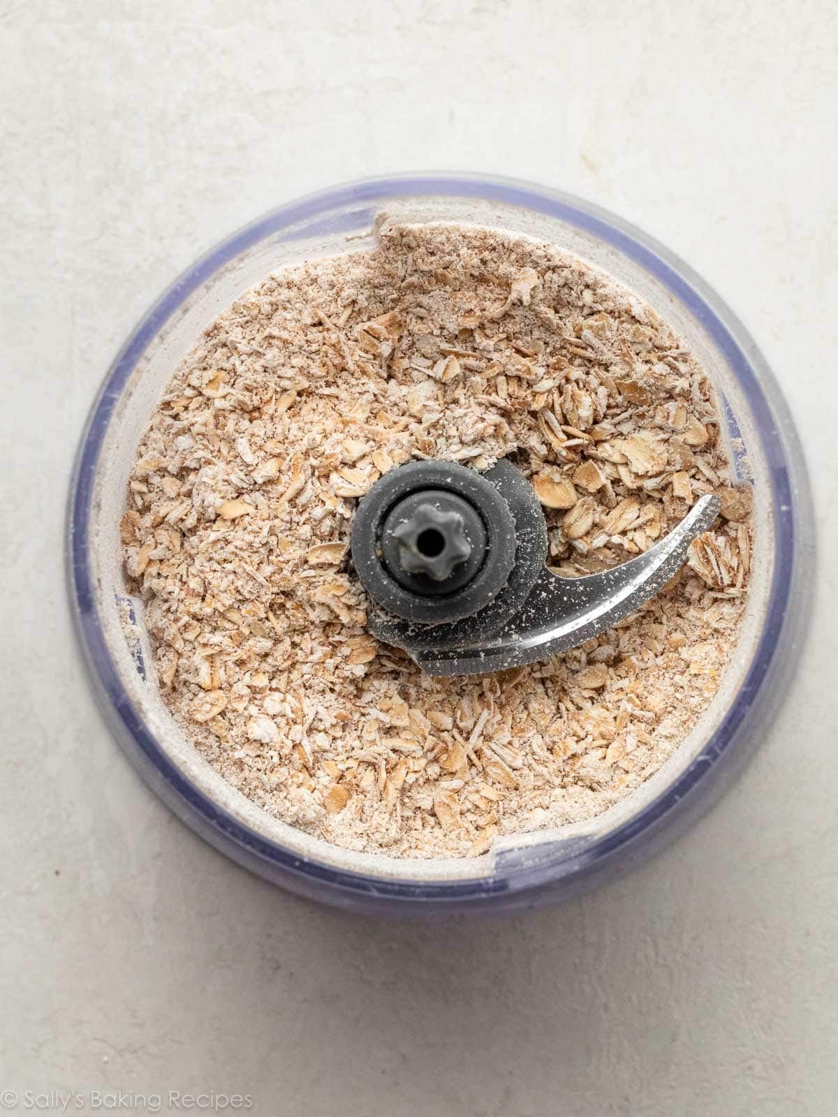 cut oats pictured in a food processor.