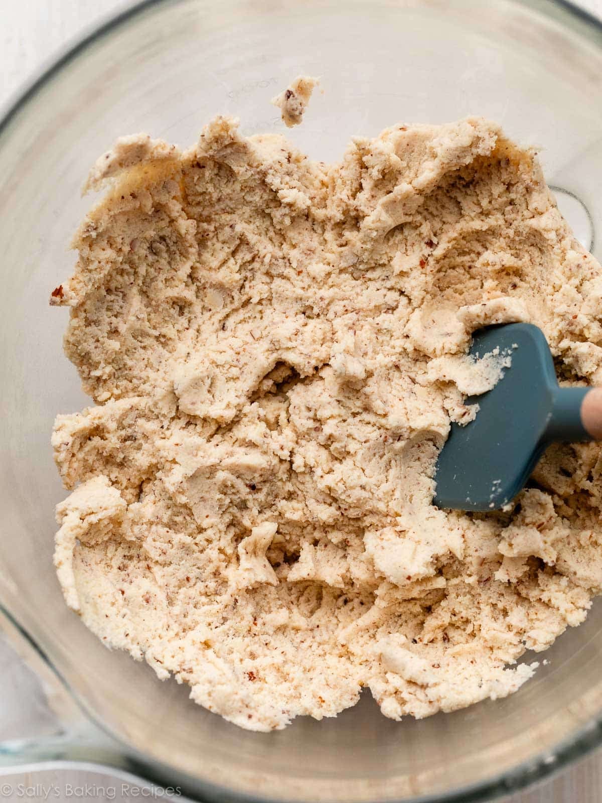 buttery cookie dough in glass bowl.
