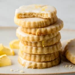stack of iced lemon shortbread cookies.