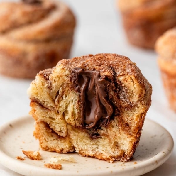 nutella stuffed cruffin on small plate.