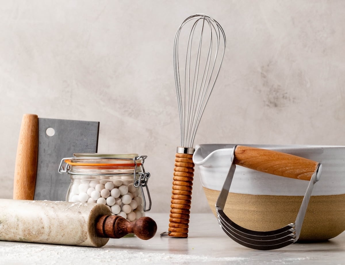 wire whisk, rolling pin, bowl, and other baking tools