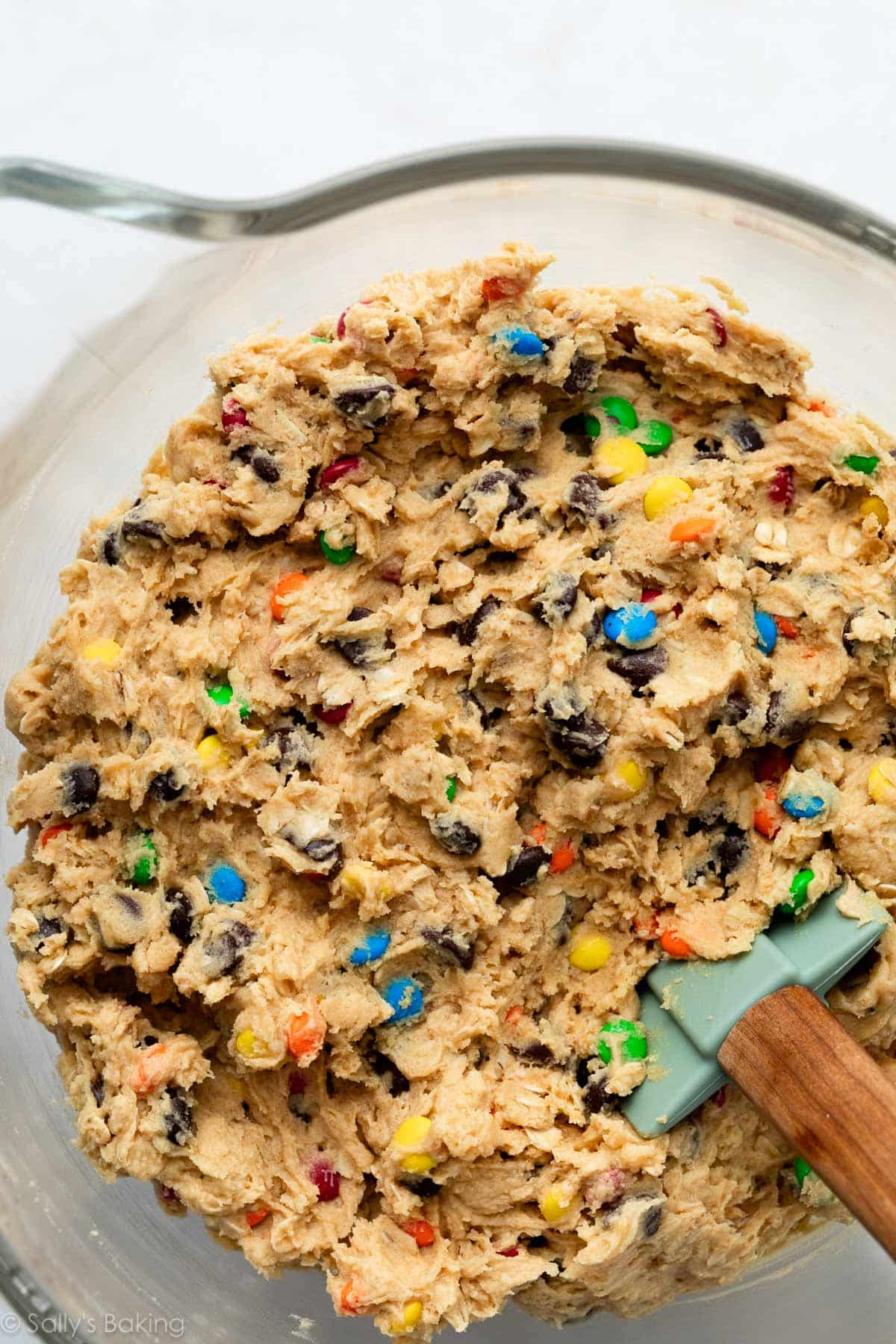 spatula in oatmeal M&M cookie dough.