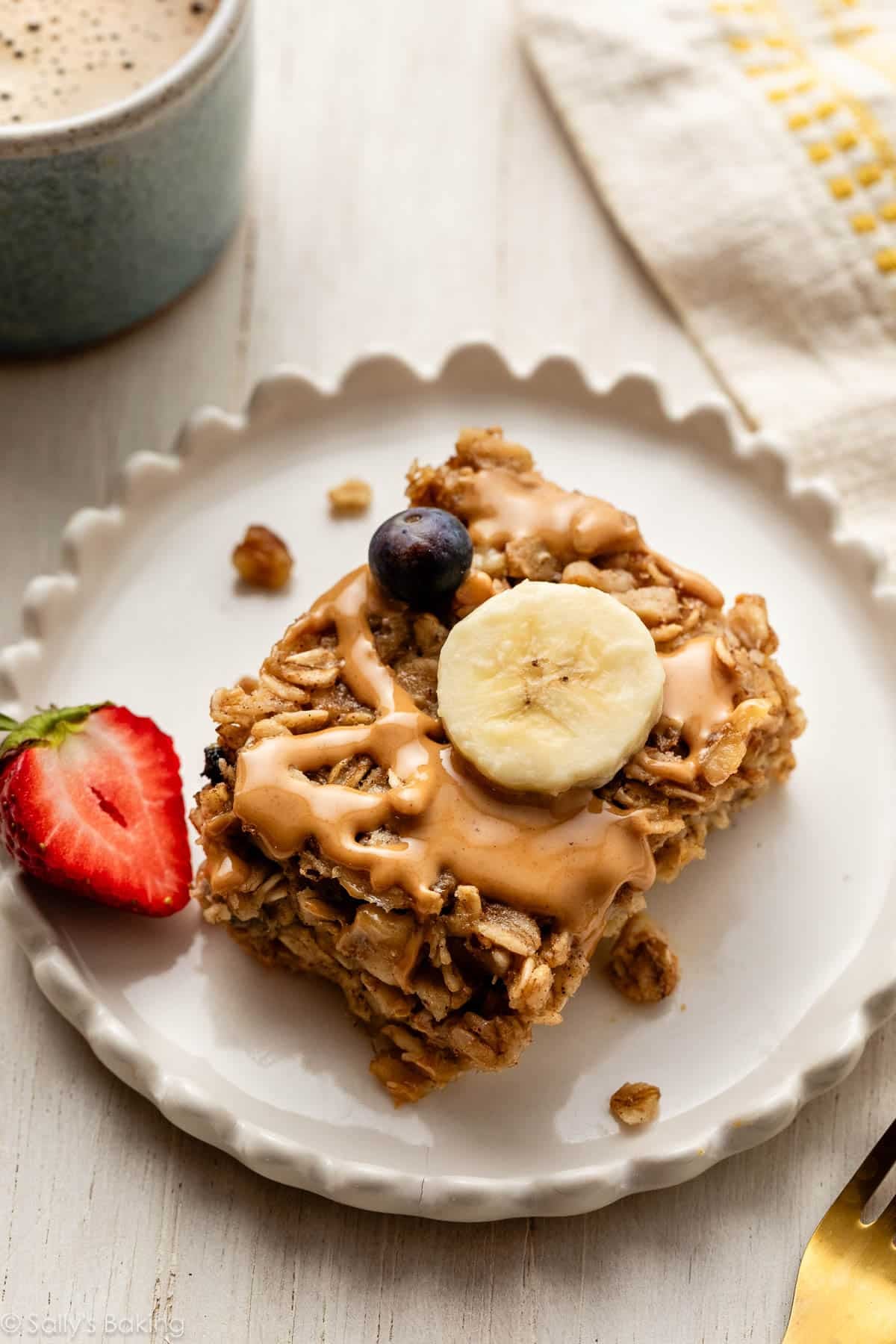 serving of banana baked oatmeal with melted peanut butter on top.
