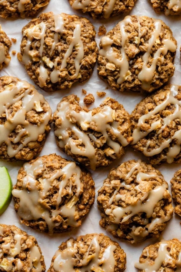 apple cinnamon oatmeal cookies with icing on top.