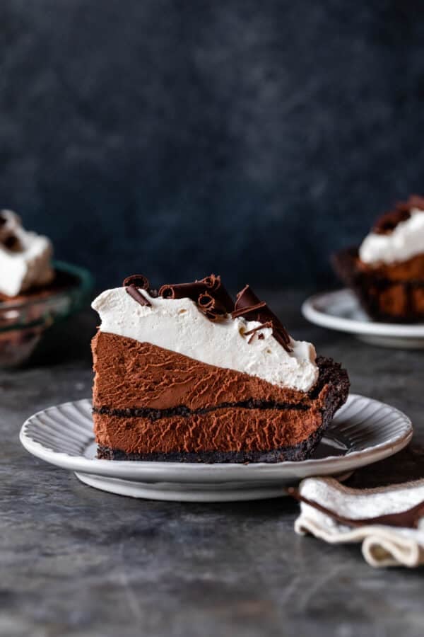 slice of chocolate mousse pie on gray plate.