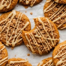 pumpkin crumb cake cookies with maple icing.