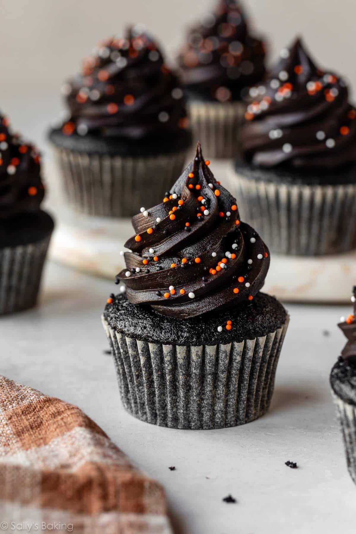 black velvet cupcakes with Halloween sprinkles.