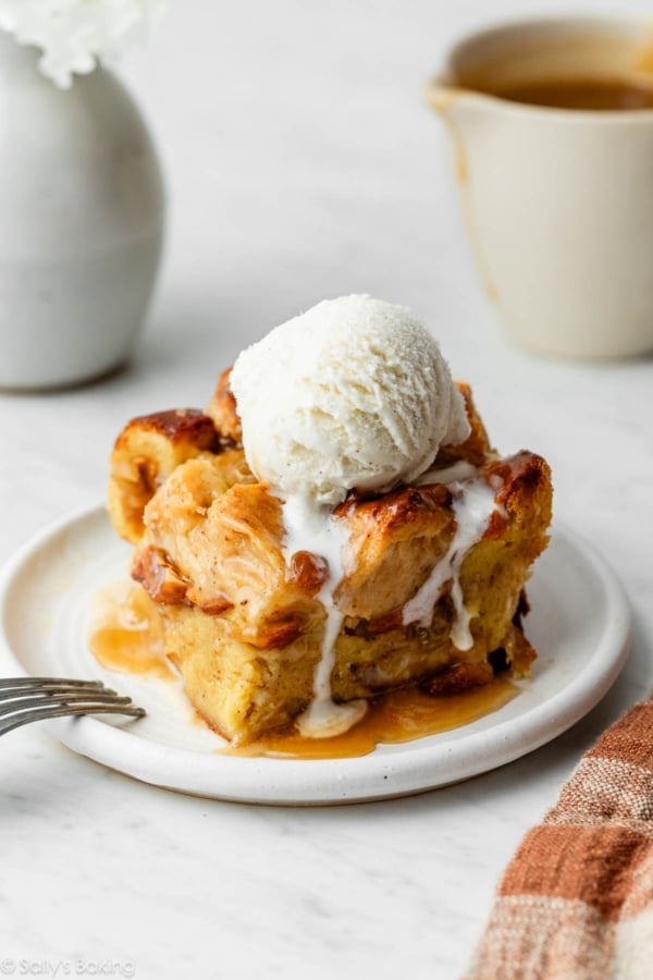 piece of bread pudding with vanilla ice cream.