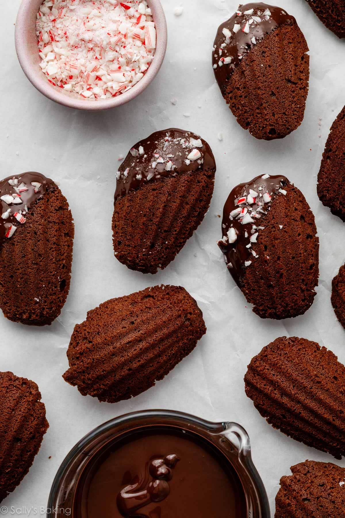 chocolate madeleines with some dipped in chocolate.