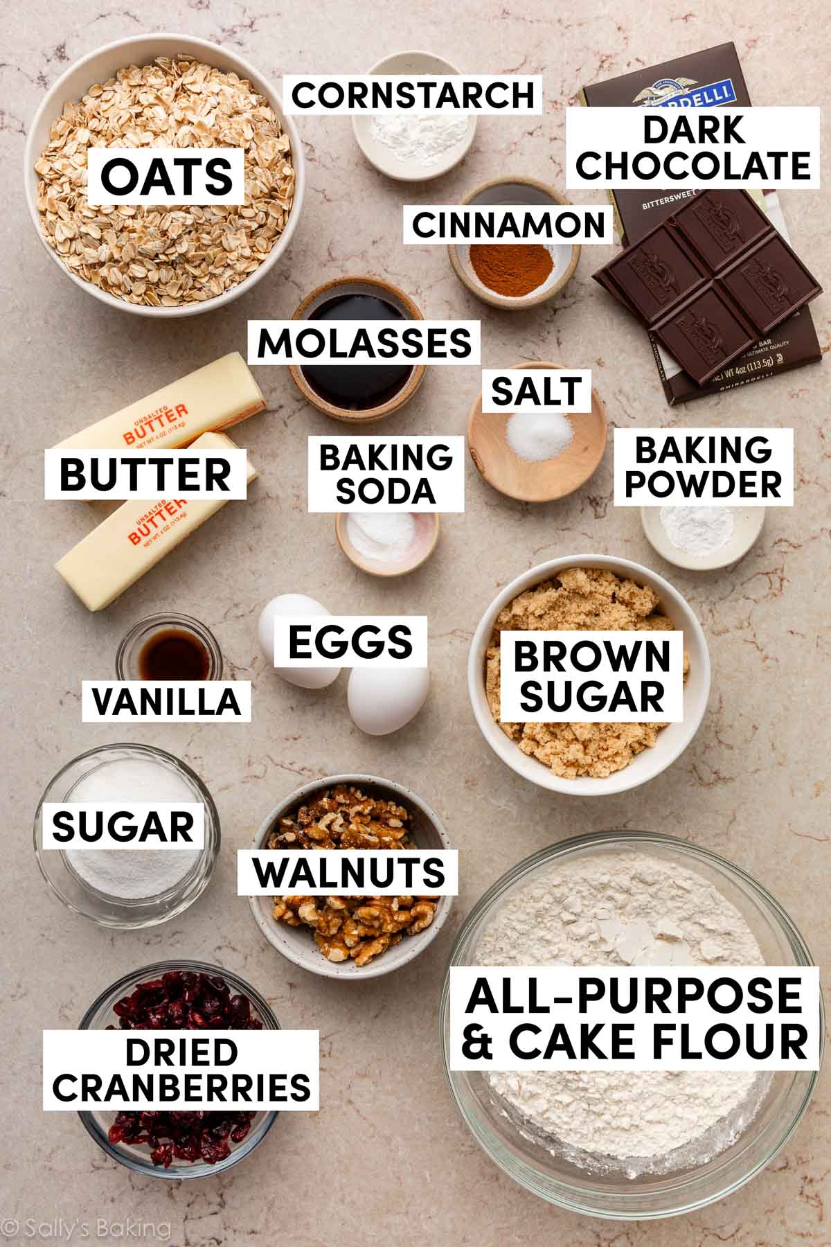 ingredients in bowls including oats, flour, brown sugar, walnuts, sugar, and butter.