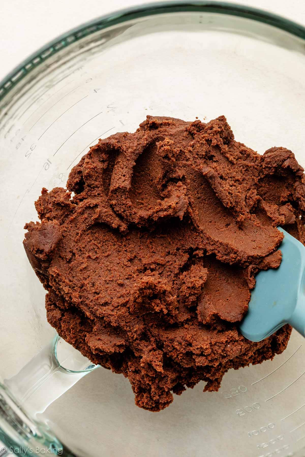 chocolate cookie dough in glass bowl.