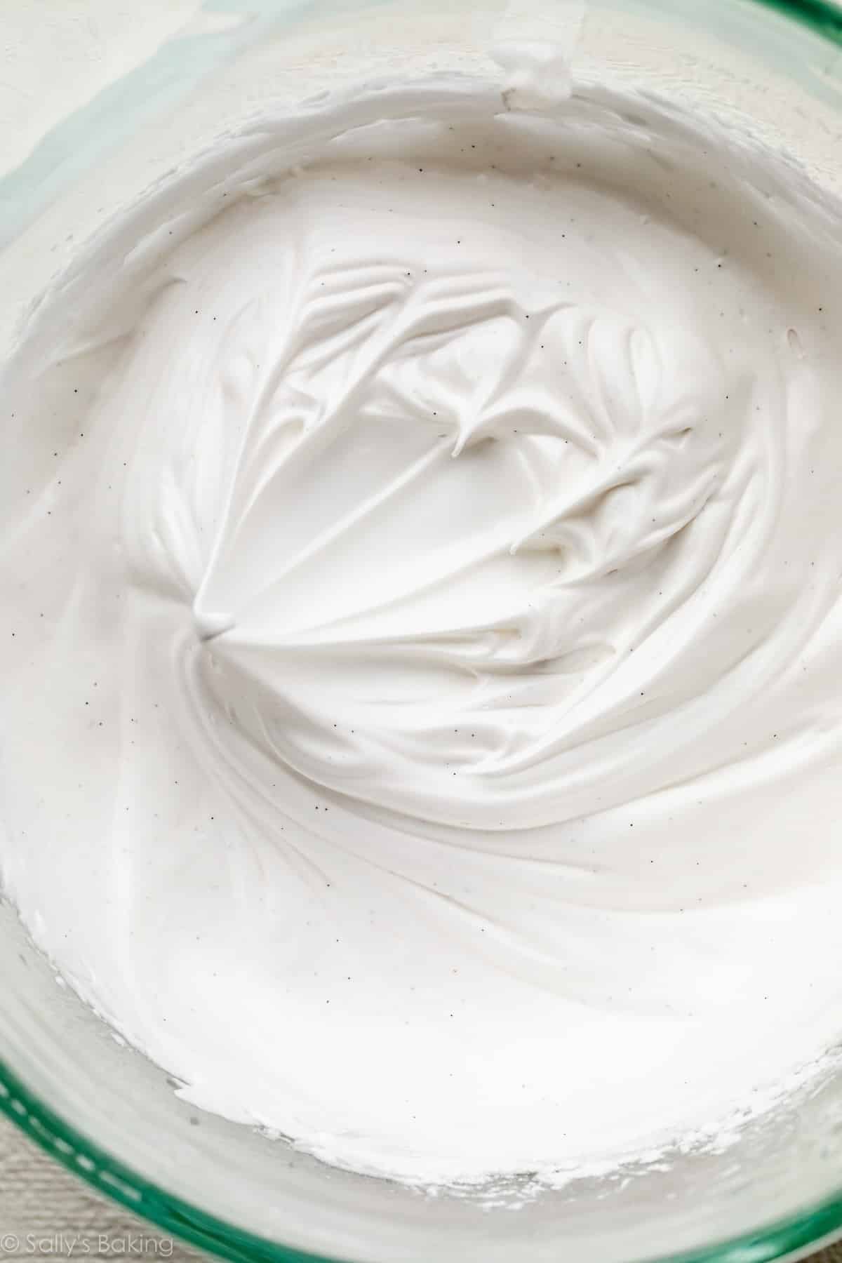 meringue with stiff peaks in bowl.