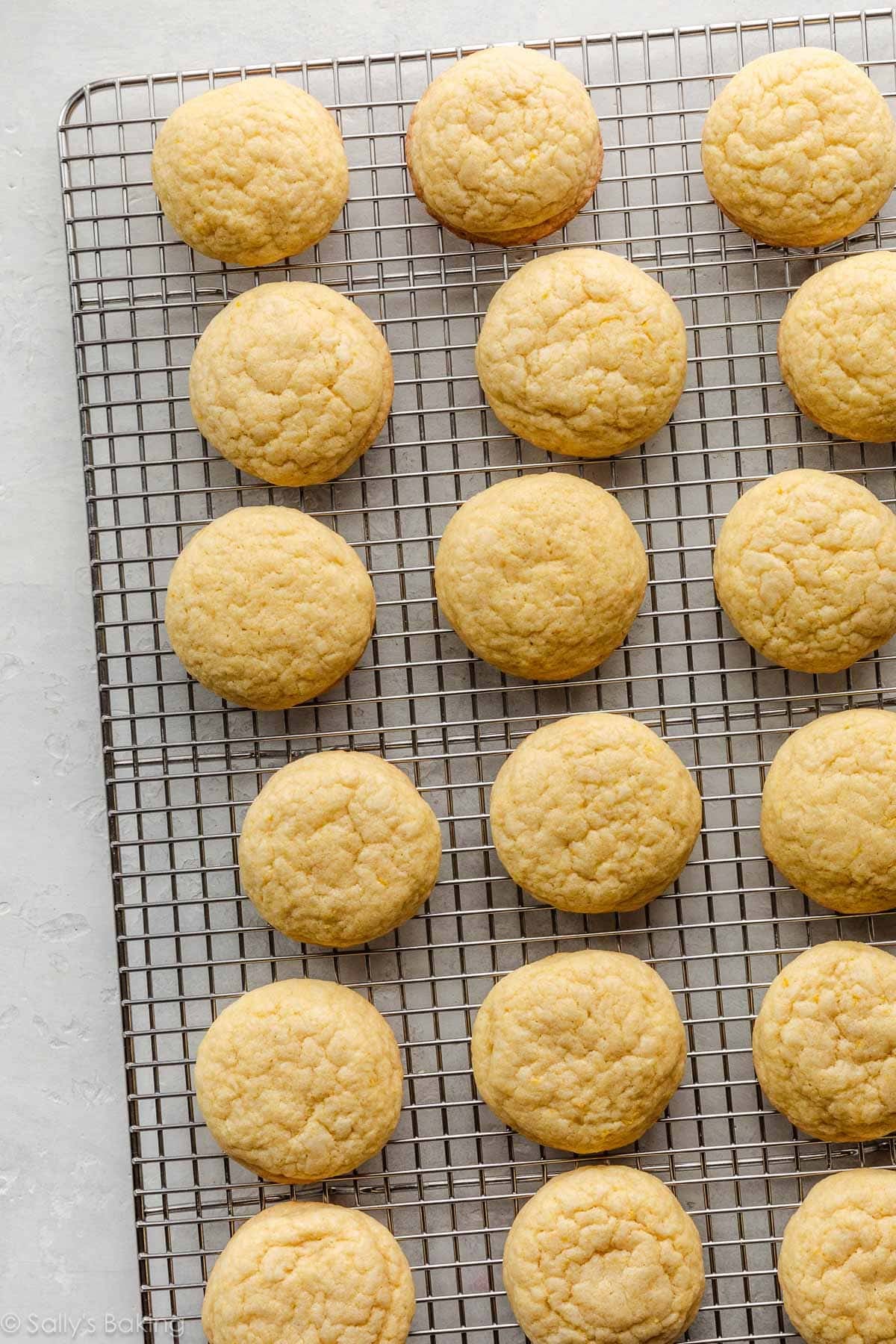 lemon cookies on cooling rack.